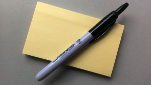 Super-Sticky Post Its and a retractable Sharpie.